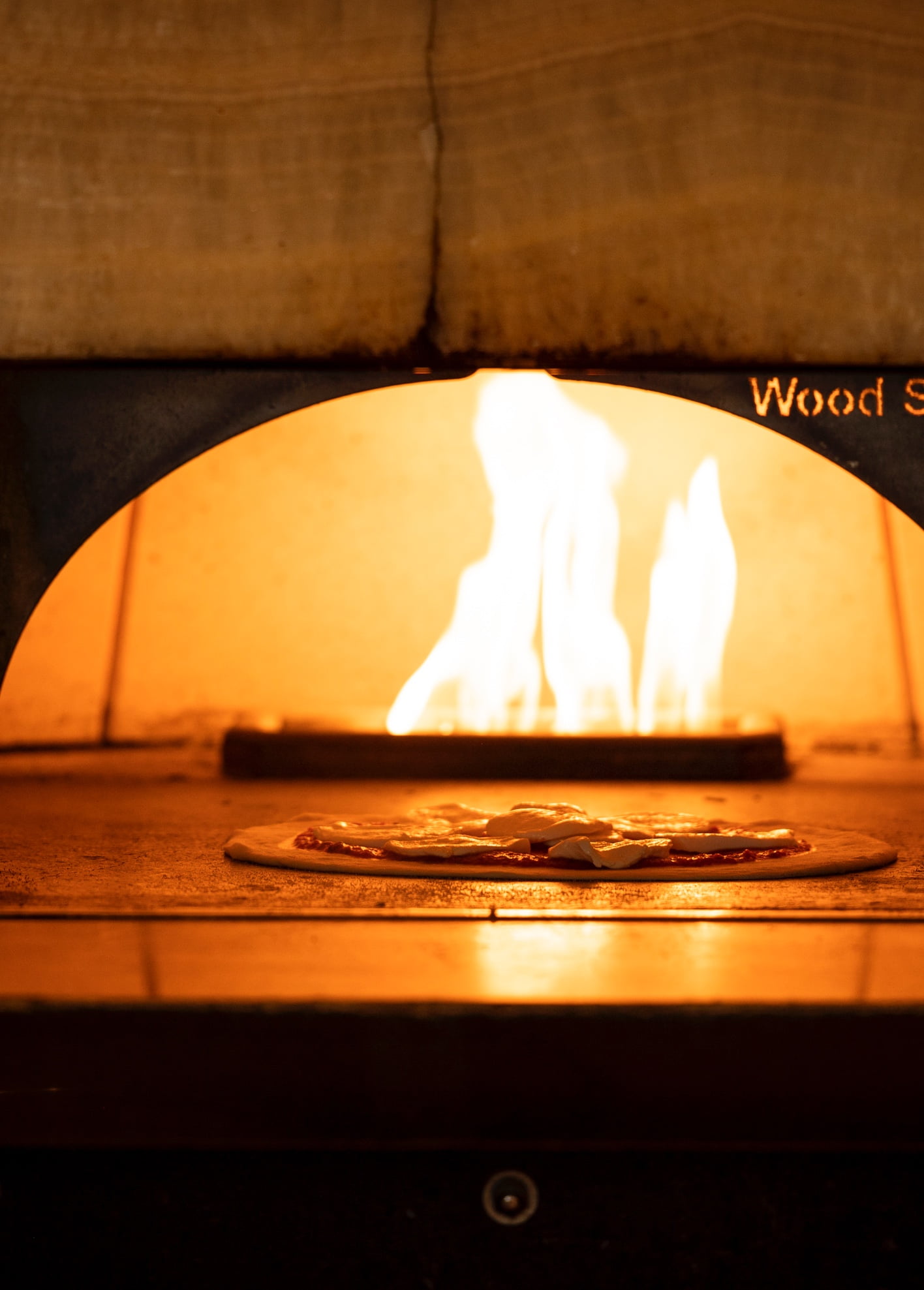 Fire burning in a wood-fired oven